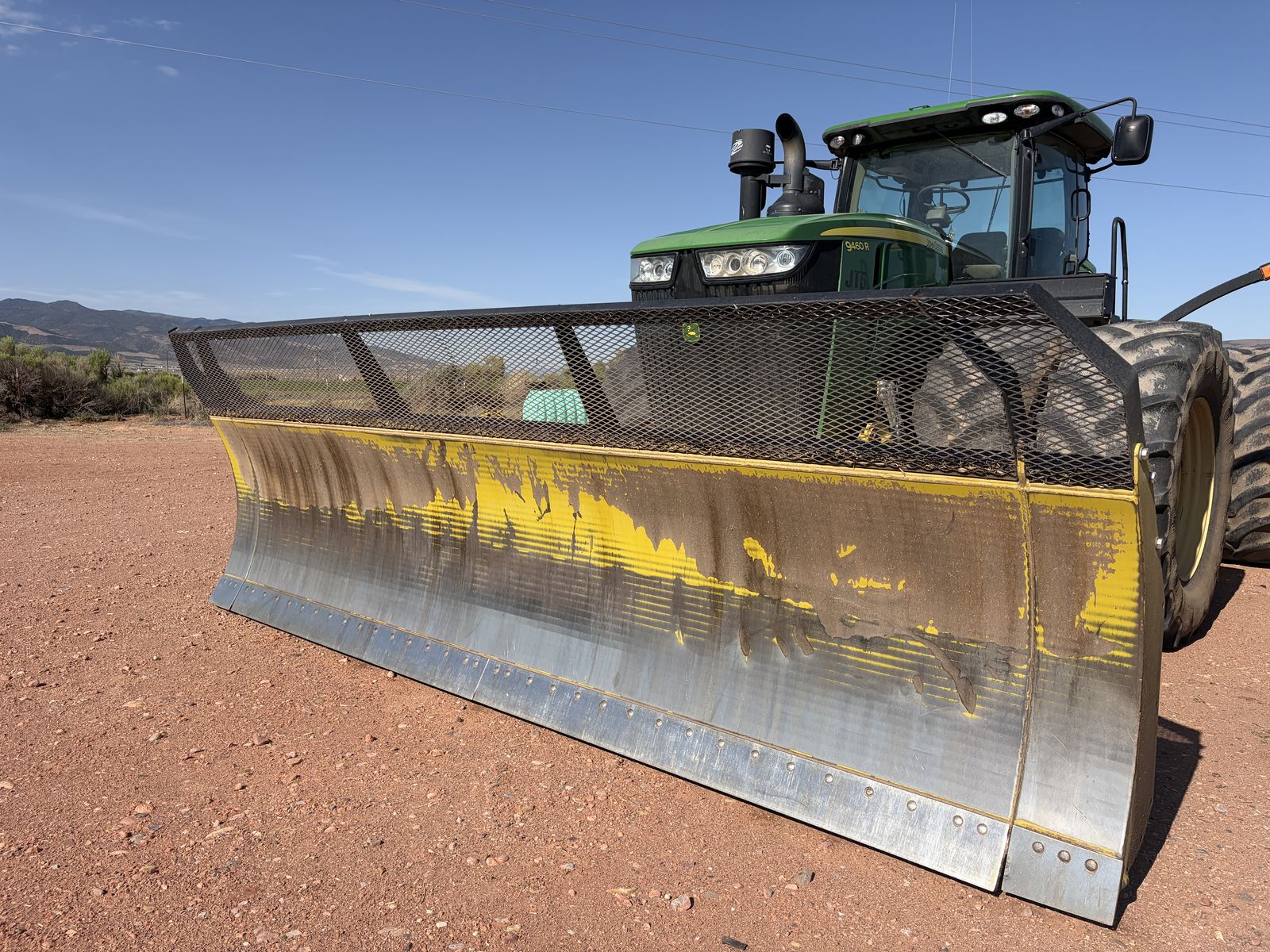 2012 John Deere 9460R 4WD Tractor with 16' Degelman Dozer Blade
