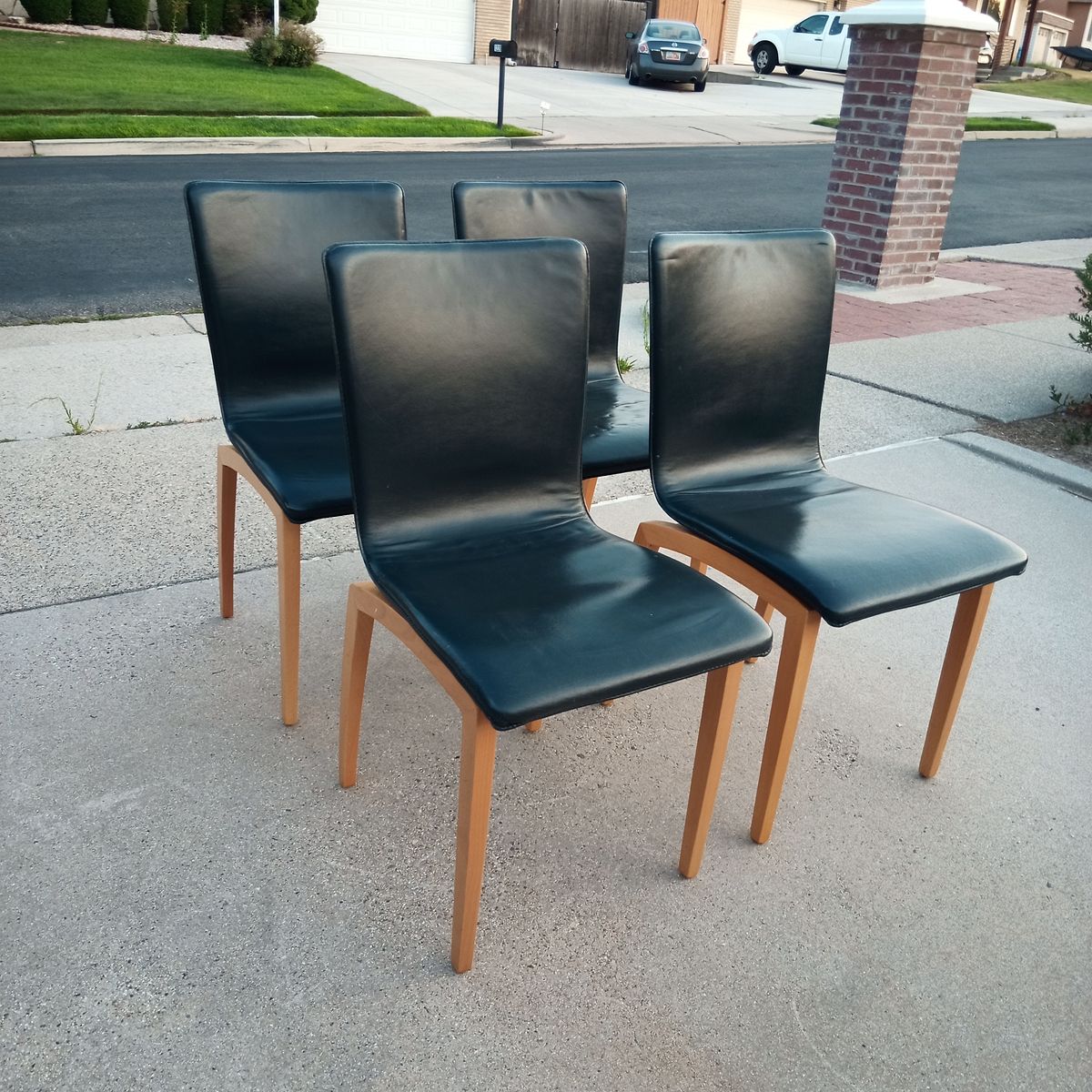 Set of four vintage leather and beech 'Libra' dining chairs