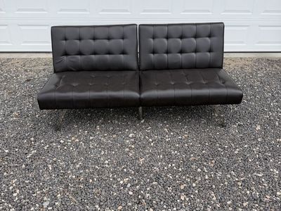 Black Tufted Faux Leather Futon Sofa Bed with Chrome Legs - Convertible & Compact
