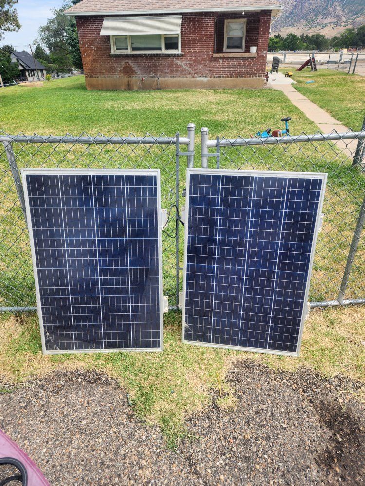 Pair of Used Coleman 100w Solar Panels - Good Condition for Off-Grid or Supplemental Power