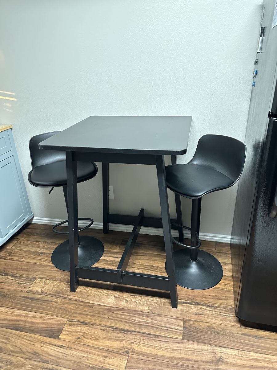 Bar height table and chairs