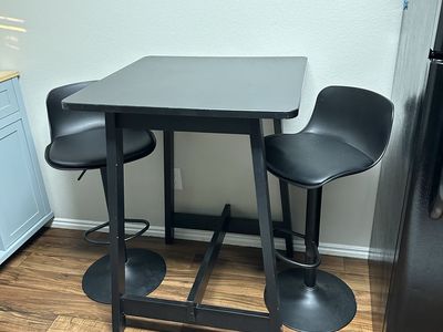 Bar height table and chairs