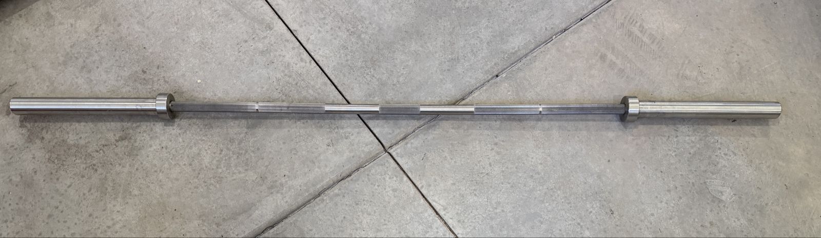Rogue Power bar and rackable curl bar.