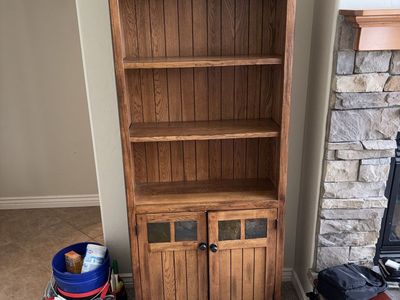 Really nice book case with cupboard storage
