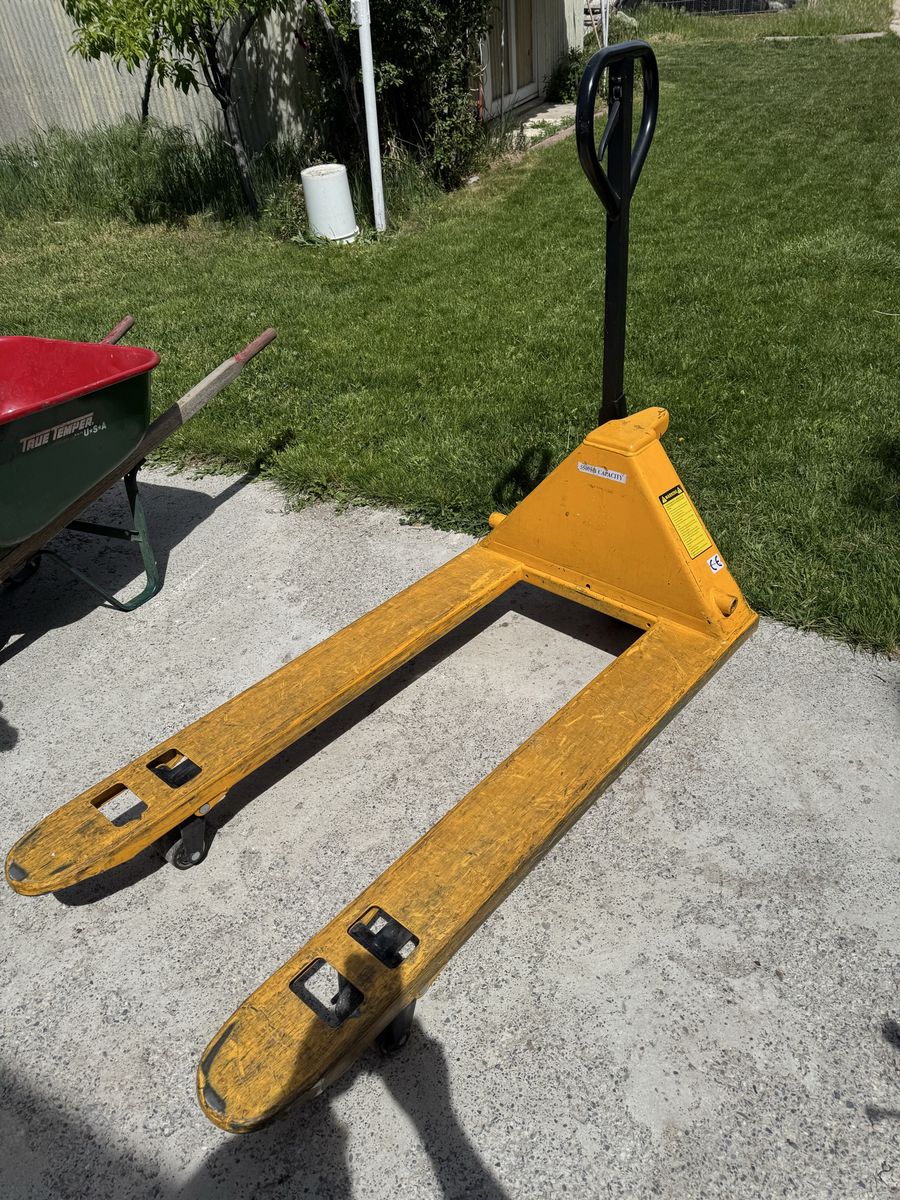 ULine Pallet Jack, Huge: 5,500 #s capacity. Good Rollers Works great!