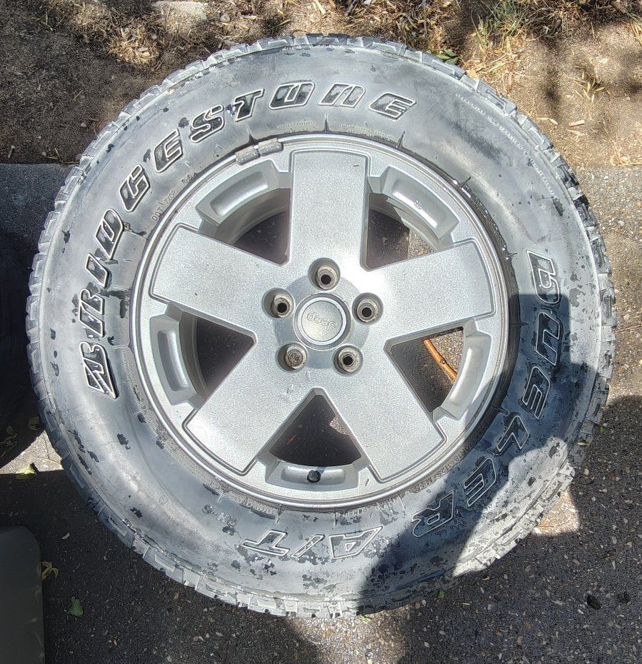 Bridgestone Dueler A/T Tire on Jeep Wheel - Used, Good Tread