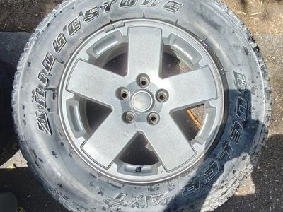 Bridgestone Dueler A/T Tire on Jeep Wheel - Used, Good Tread