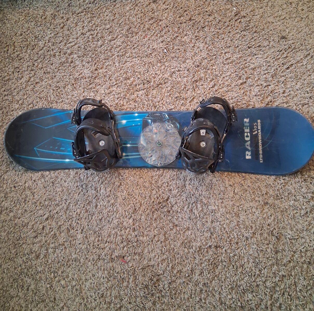 Blue racer 105 snowboard with rossignol bindings