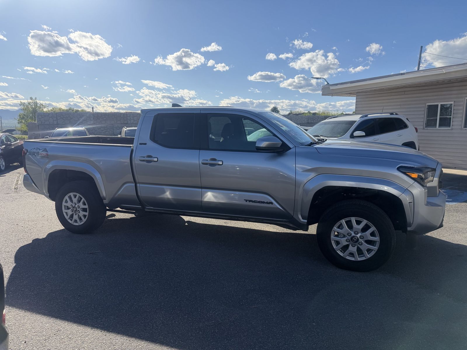 2025 Toyota Tacoma SR5 — rebuilt & branded title, 26% below market