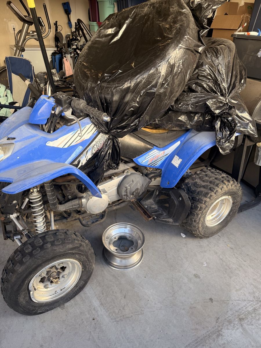 Mongoose 300cc ATV - Blue, 2006 Model, Needs Tire Repair and new carb I have replacement wheel