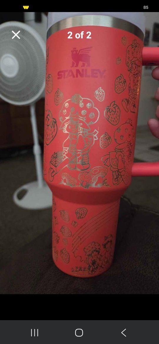 40 ounce Stanley cup with strawberry shortcake engraved on it