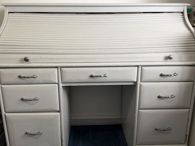 Roll top desk. Good condition, 53 1/2 inches long, 20 inches wide