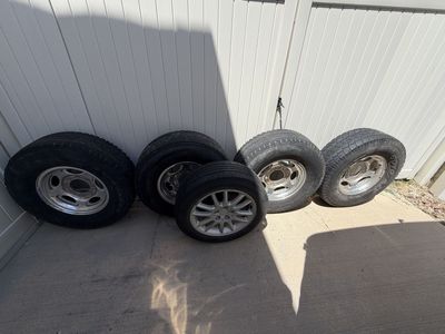Three-quarter ton Ford tires and rims and extras