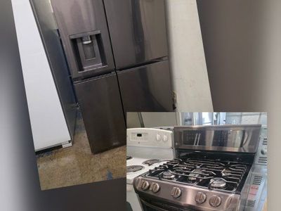 Lg black stainless refrigerator and Lg double oven