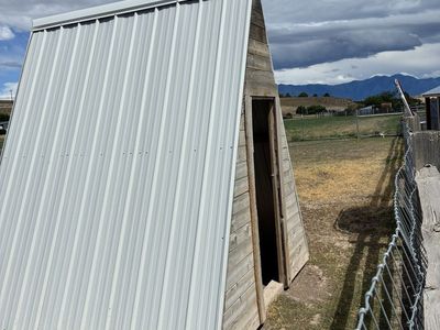 Durable A-Frame Shed - Metal Roof, Wood Siding - Versatile Outdoor Storage/Shelter