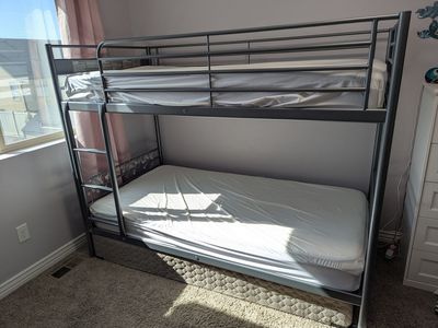Svarta ikea twin bunk bed with 2 mattresses