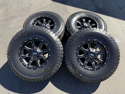 New LT265/75r16 AT Black MO970 6x5.5 Chevy GMC 6