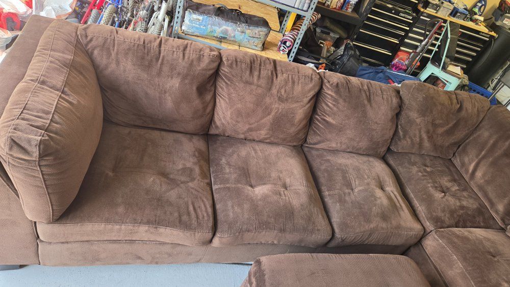 brown fabric L shaped section Couch with ottoman