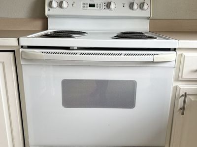 GE White Electric Range Stove with Coil Burners