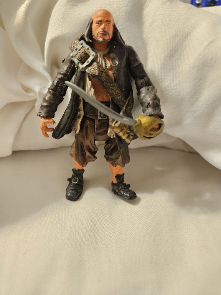 Pirates of the Caribbean Captain Barbossa Action Figure with Sword, 7-inch Collectible