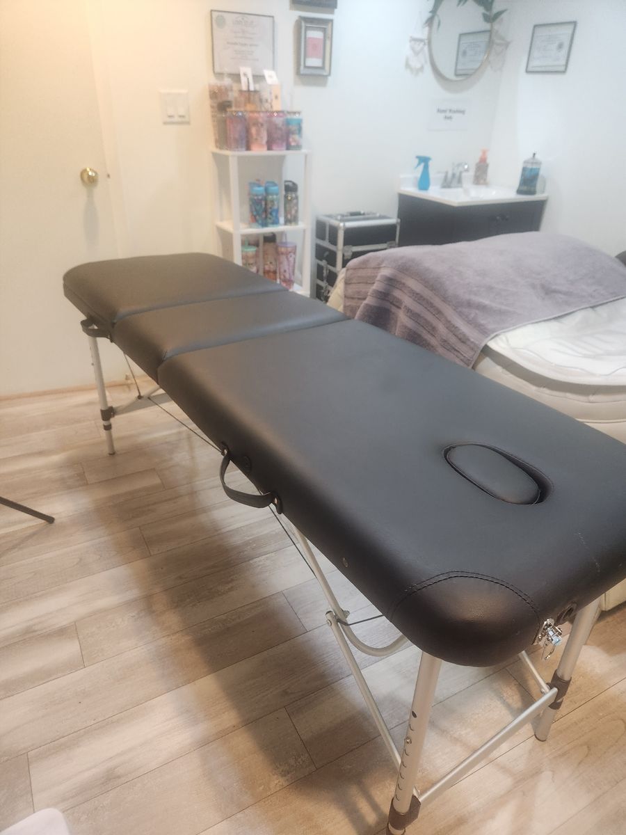 Massage table