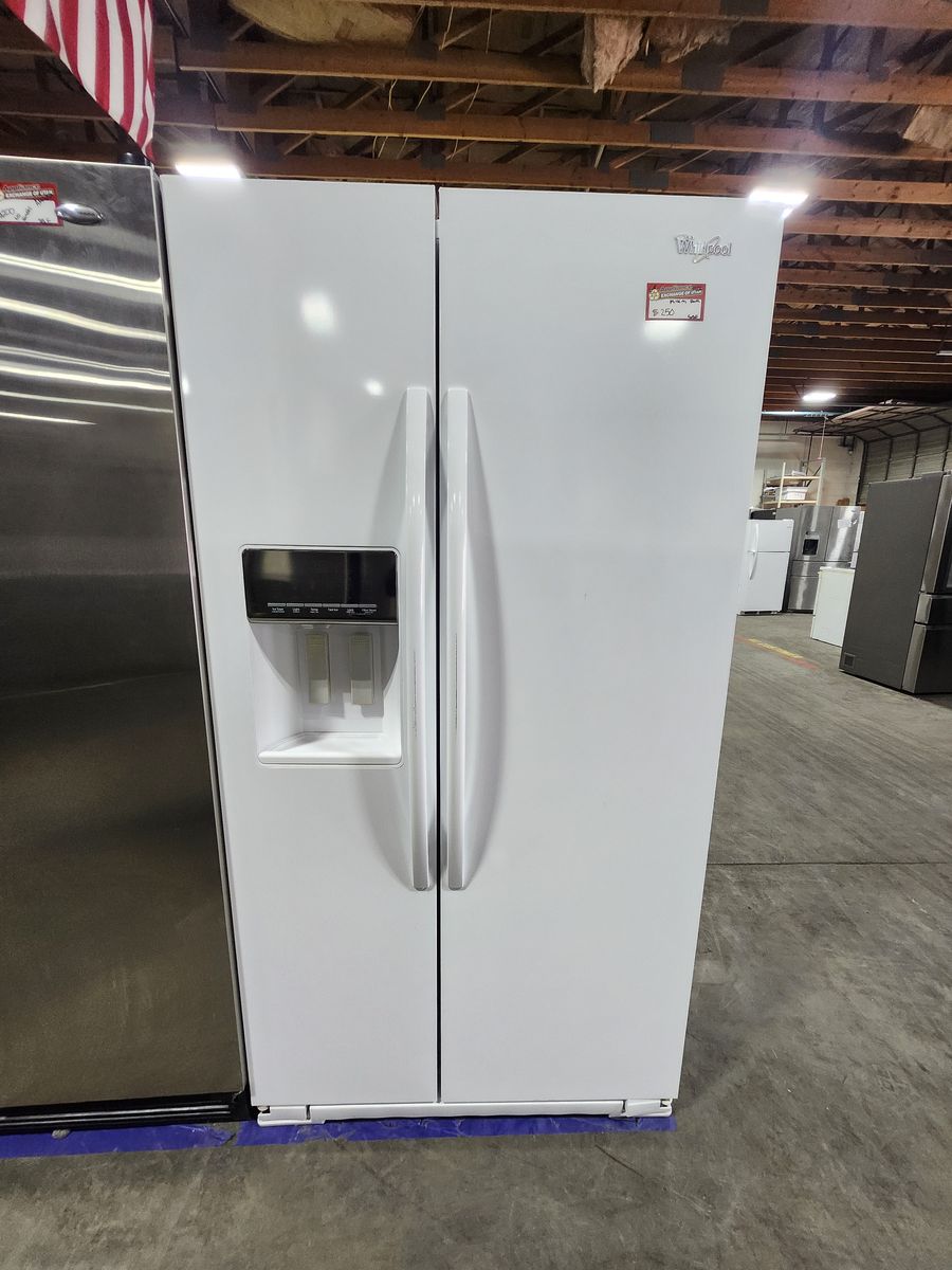 Whirlpool Side-by-Side Refrigerator in White with a Full Warranty - missing parts