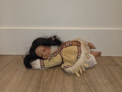 Collectible Native American Style Porcelain Doll in Traditional Attire