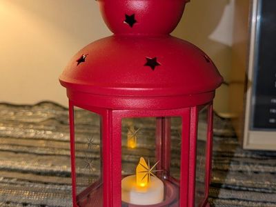 Ikea Rotera red lantern metal and glass tea light holder with battery operated candle