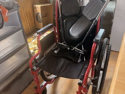 Red Folding Manual Wheelchair with Black Upholstery and Footrests