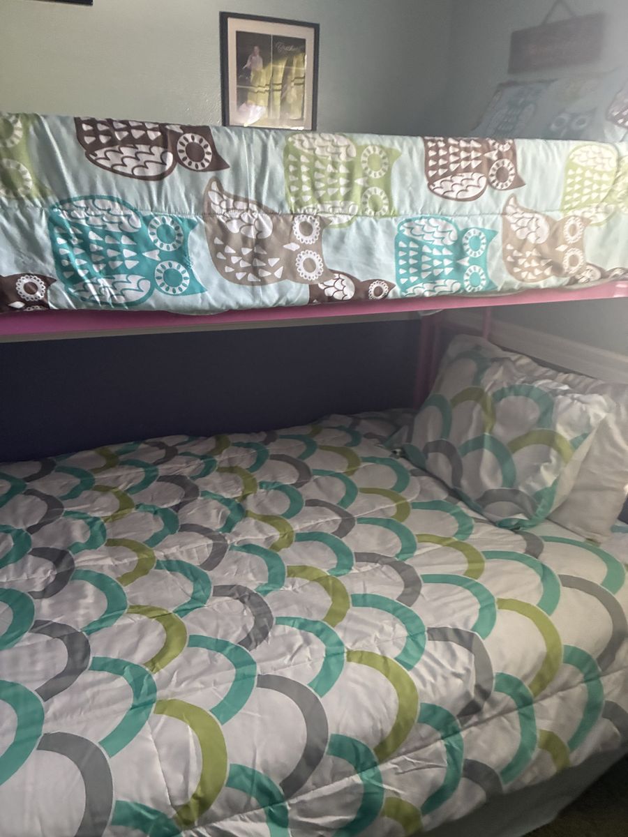 Pink Metal Bunk Bed Frame with Mattresses and Owl/Geometric Bedding Set. Double on bottom bunk and single on top.