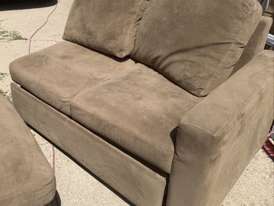 Couch with pullout bed and storage