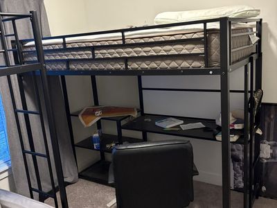Twin loft bed with desk, whiteboard and mattress