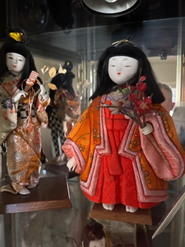 vintage Japanese Hina-ningyo doll, specifically representing a "Kansai-style" lady-in-waiting or court attendant.