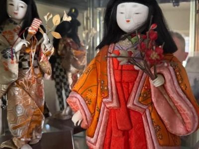 vintage Japanese Hina-ningyo doll, specifically representing a "Kansai-style" lady-in-waiting or court attendant.