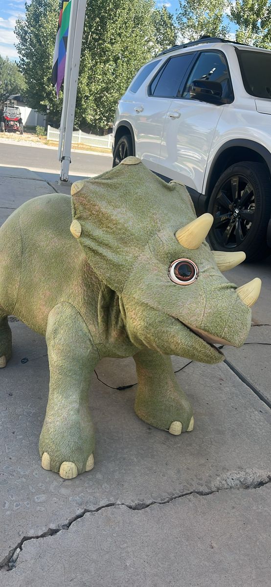Large playskool Triceratops Dinosaur sit on toy.