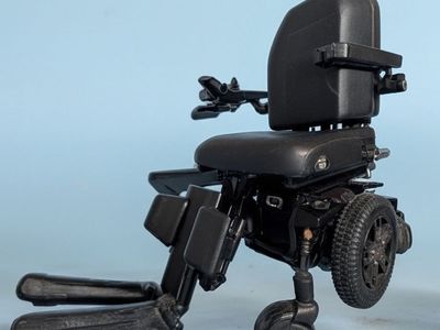 Quantum Edge Power Wheelchair with Joystick and Headrest