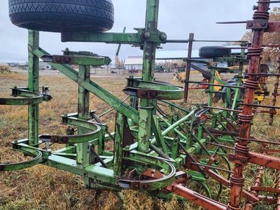 John Deere C11 field cultivator