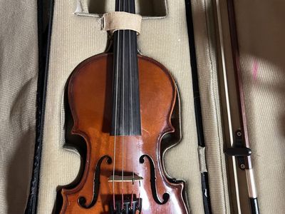 Two children’s violins
