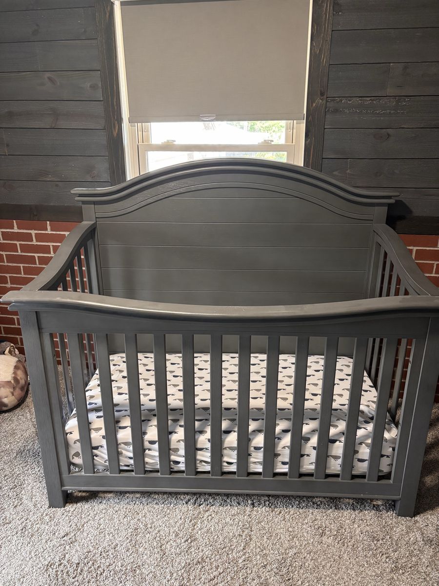 Grey wood baby crib
