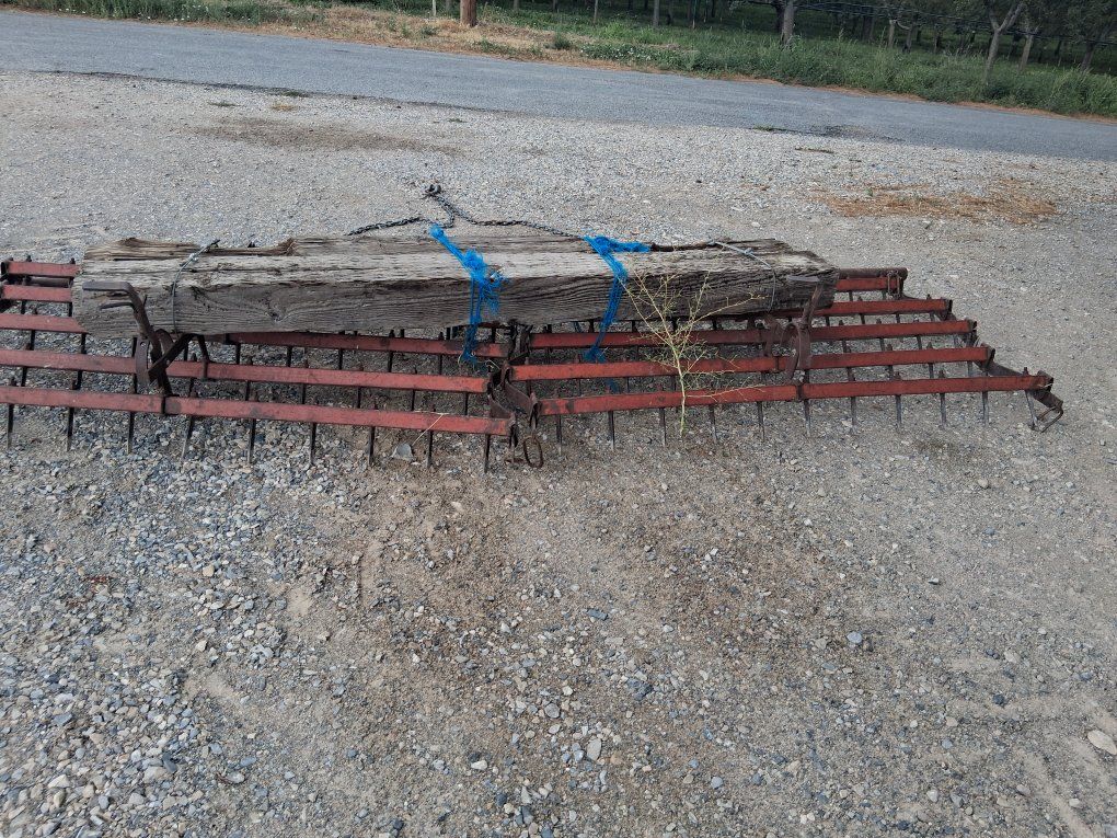 Tine horrow drag with pull bar and chain