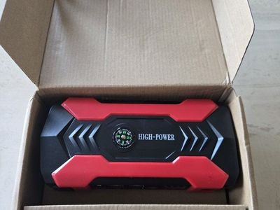 High-Power Multi-Function Car Jump Starter 28000mAh with 4 USB Ports, Start current 400A Peak Current 800A NEW IN BOX