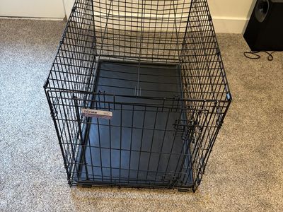 DOG CRATE COMES WITH FREE COVER!