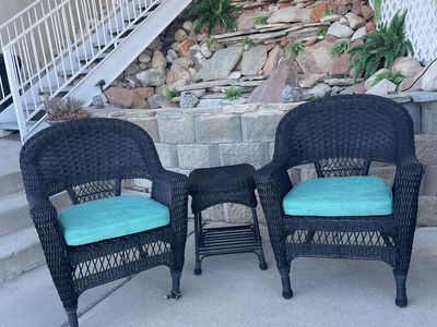 outdoor faux wicker chairs w/ tables