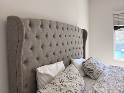 Ashley King Size Bed Frame - Gray Tufted Wingback Upholstered with Box Spring, Excellent Condition