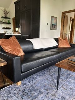 Black leather sofa