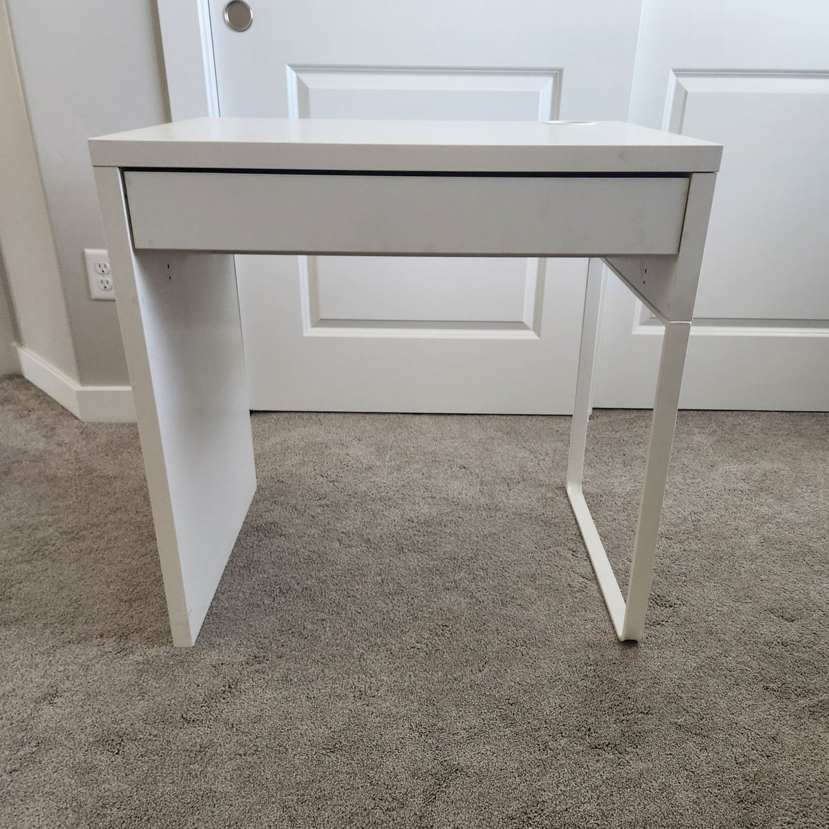 Small white desk from Ikea with drawer.