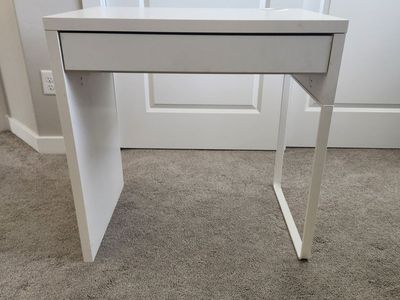 Small white desk from Ikea with drawer.