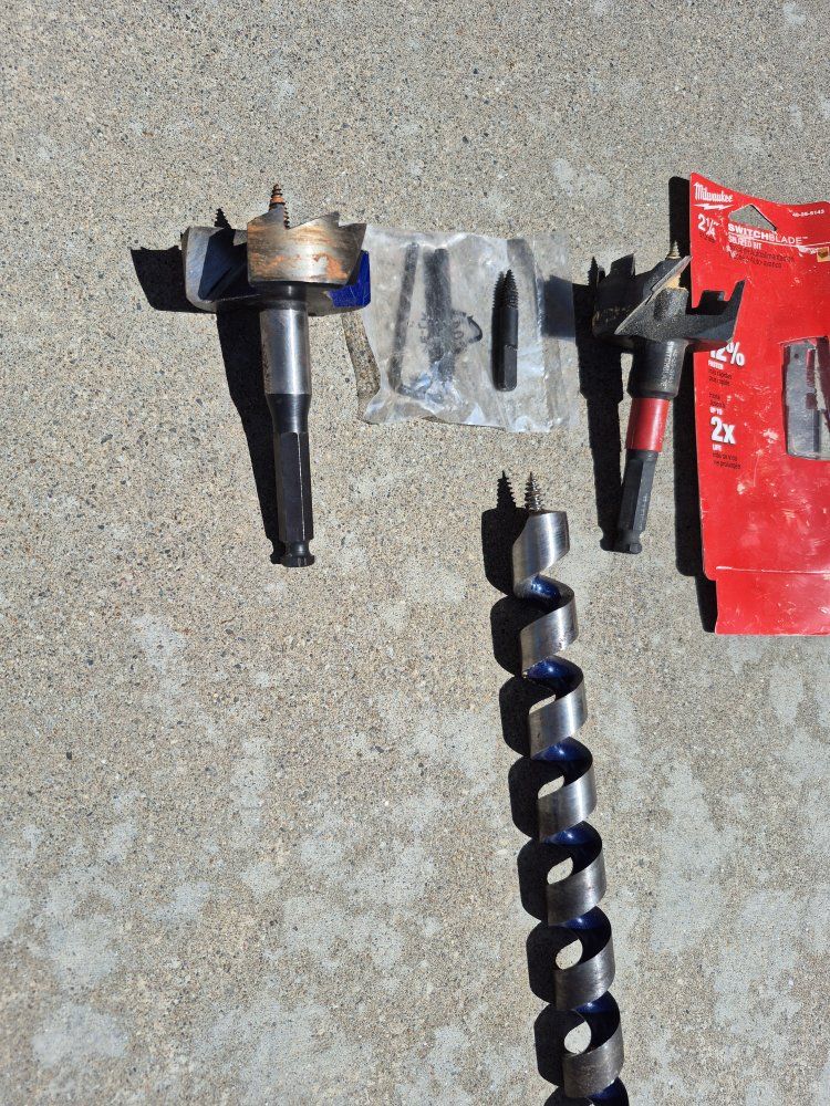Milwaukee 2-1/4" Switchblade Selfeed Bit. Irwin 2 1/2"Selfeed.
1" Irwin auger 12"long.