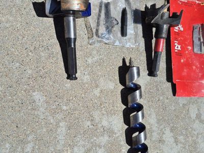 Milwaukee 2-1/4" Switchblade Selfeed Bit. Irwin 2 1/2"Selfeed.
1" Irwin auger 12"long.