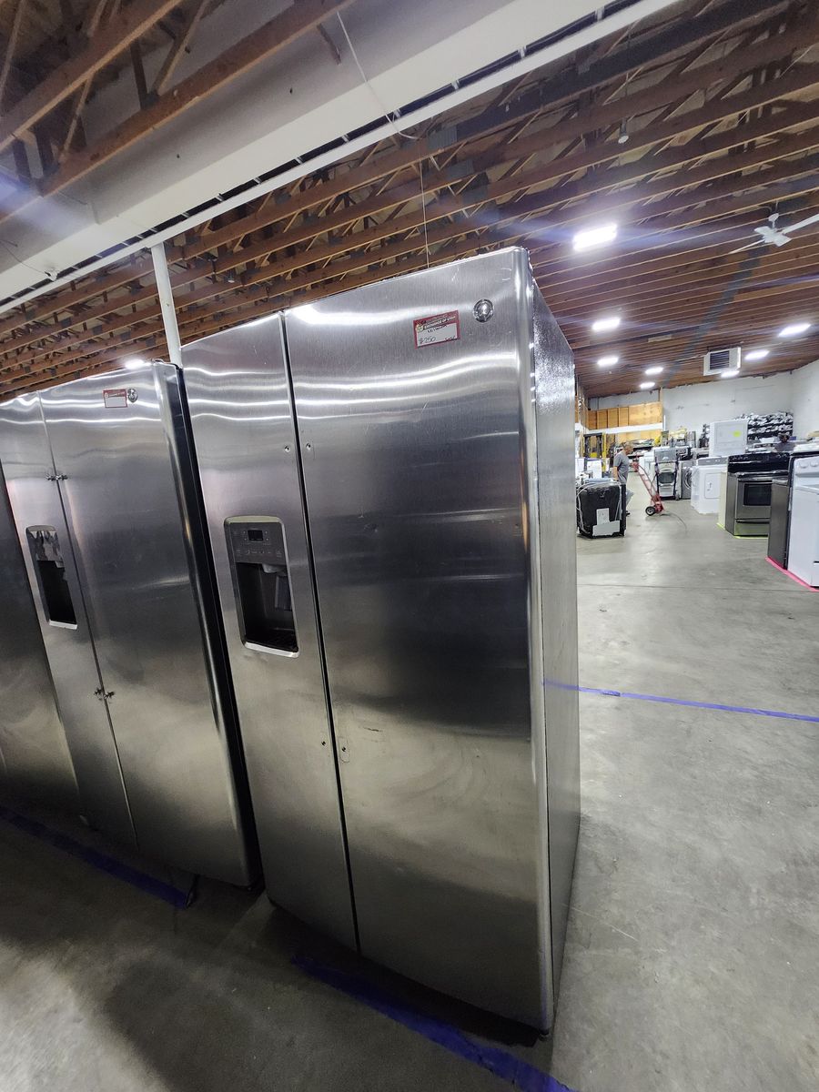 GE Stainless Steel Side-by-Side Refrigerator - missing handles